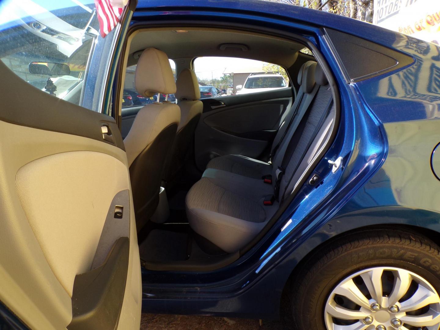 2017 Blue /Gray Hyundai Accent SE 4-Door 6M (KMHCT4AE1HU) with an 1.6L L4 DOHC 16V engine, Automatic 6-Speed transmission, located at 16710 Clay Rd., Houston, TX, 77084, (281) 859-7900, 29.834864, -95.656166 - Photo#16