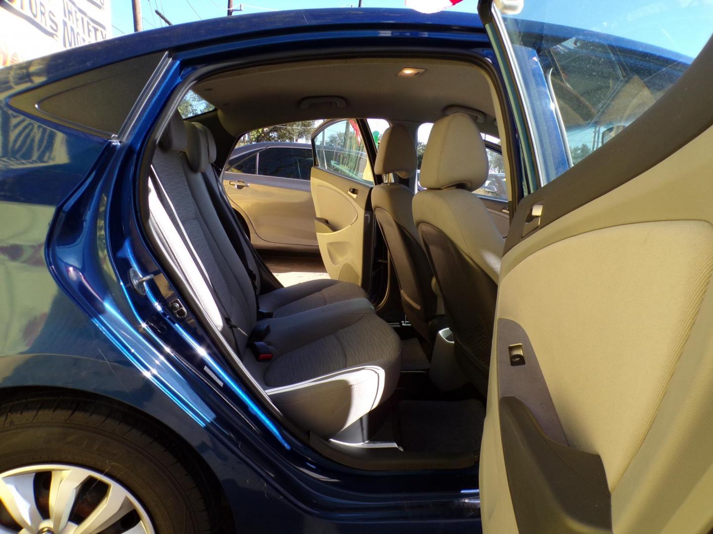 2017 Blue /Gray Hyundai Accent SE 4-Door 6M (KMHCT4AE1HU) with an 1.6L L4 DOHC 16V engine, Automatic 6-Speed transmission, located at 16710 Clay Rd., Houston, TX, 77084, (281) 859-7900, 29.834864, -95.656166 - Photo#18