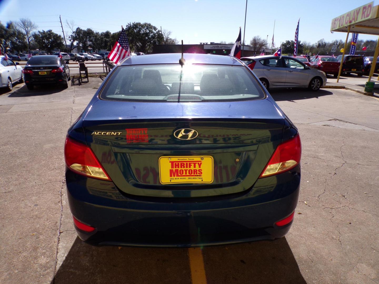2017 Blue /Gray Hyundai Accent SE 4-Door 6M (KMHCT4AE1HU) with an 1.6L L4 DOHC 16V engine, Automatic 6-Speed transmission, located at 16710 Clay Rd., Houston, TX, 77084, (281) 859-7900, 29.834864, -95.656166 - Photo#10