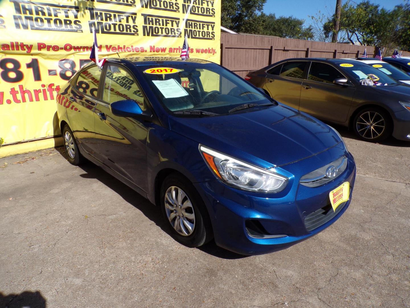 2017 Blue /Gray Hyundai Accent SE 4-Door 6M (KMHCT4AE1HU) with an 1.6L L4 DOHC 16V engine, Automatic 6-Speed transmission, located at 16710 Clay Rd., Houston, TX, 77084, (281) 859-7900, 29.834864, -95.656166 - Photo#0