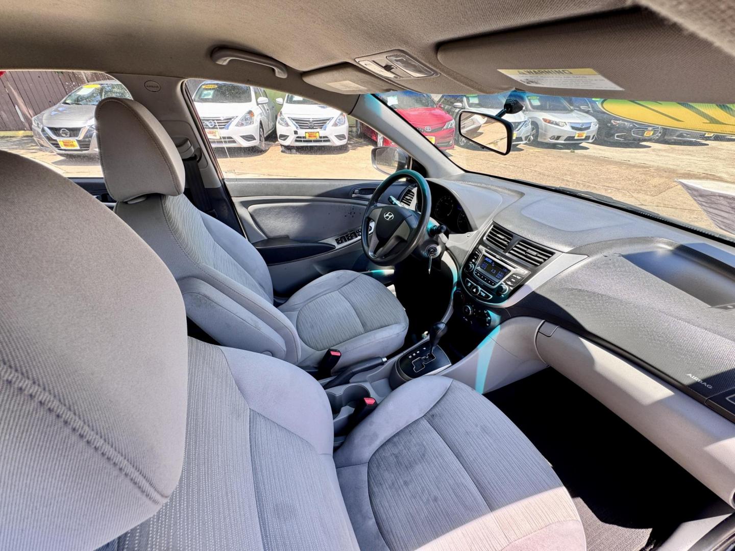 2017 Black /Gray Hyundai Accent (KMHCT4AE8HU) , Automatic 6-Speed transmission, located at 16710 Clay Rd., Houston, TX, 77084, (281) 859-7900, 29.834864, -95.656166 - Photo#10